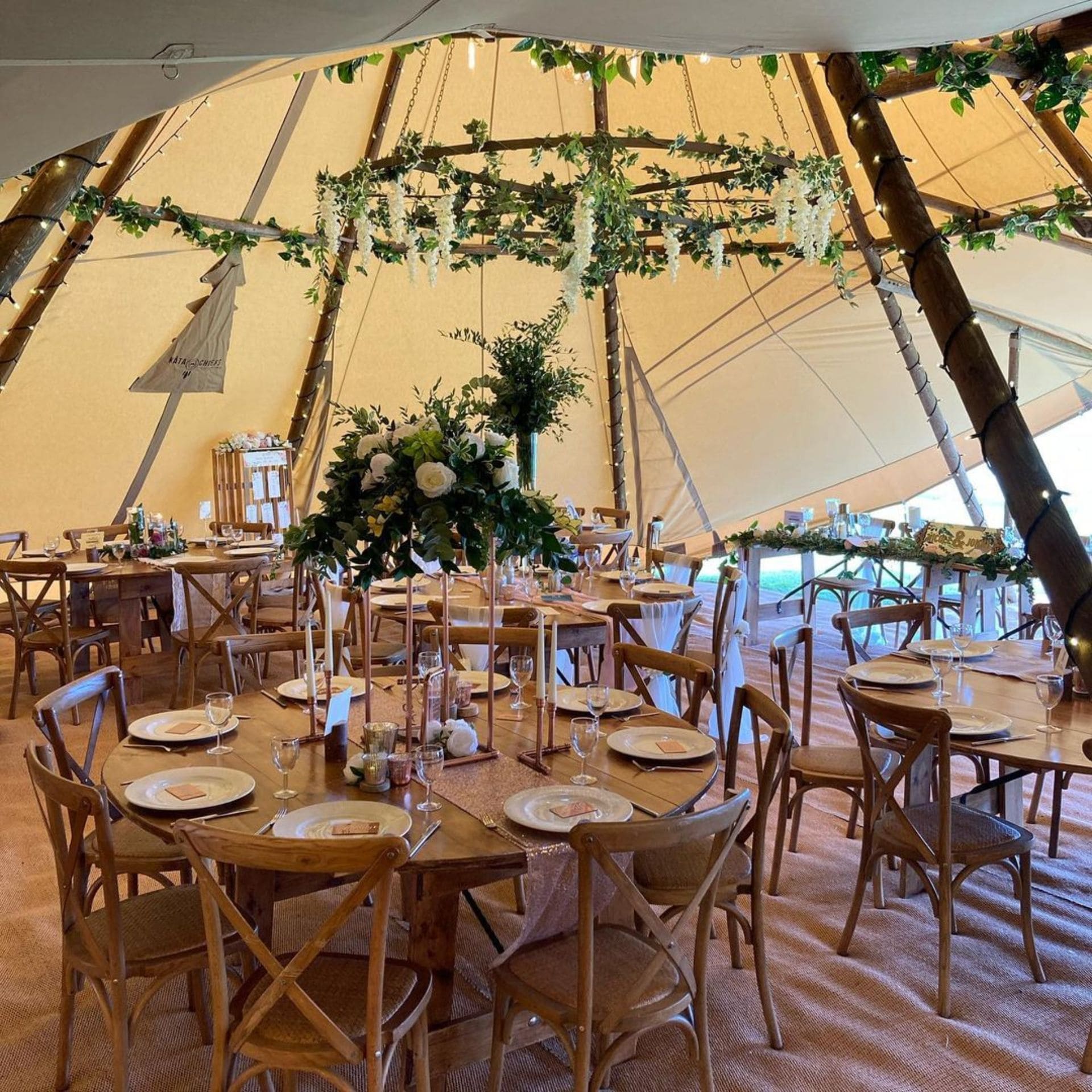 Two Tipis with Round Tables for Weddings